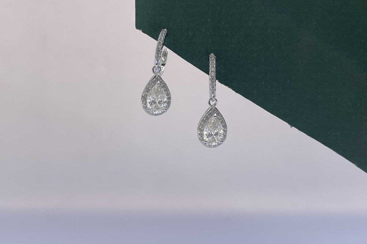 ITURA pear drop huggies in sterling silver